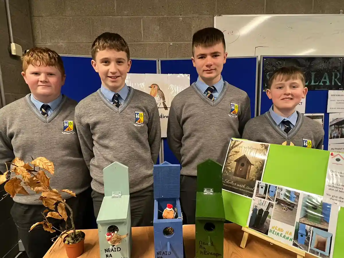Boys standing with their Junior Business Cycle Project at St. Patrick's Boys Secondary School, Castleisland